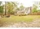 House backyard with deck and firepit at 309 Wintergreen Rd, Walterboro, SC 29488