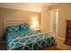 Cozy bedroom with white metal bed frame and side table at 309 Wintergreen Rd, Walterboro, SC 29488