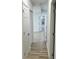 Bright hallway with hardwood floors and access to multiple rooms at 861 Savage Rd, Charleston, SC 29414
