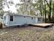 Newly built home with light blue siding and deck at 861 Savage Rd, Charleston, SC 29414