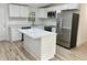 Modern kitchen featuring stainless steel appliances and an island at 861 Savage Rd, Charleston, SC 29414
