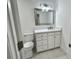 Bathroom with white vanity, marble countertop and large mirror at 861 Savage Rd, Charleston, SC 29414