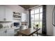 Bright home office with built-in shelving, large window, and workspace at 00 Handsome Dr, Johns Island, SC 29455