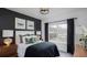 Cozy bedroom with dark walls, window seating, and plenty of natural light at 00 Handsome Dr, Johns Island, SC 29455