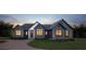 Modern two-story home with dark siding and brick walkway at 00 Handsome Dr, Johns Island, SC 29455