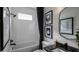 Clean bathroom with a modern soaking tub, contemporary tile, and stylish mirror at 00 Handsome Dr, Johns Island, SC 29455