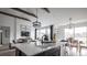 Kitchen island with white quartz countertop and black cabinetry at 00 Handsome Dr, Johns Island, SC 29455
