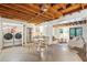 Basement with laundry, kitchenette, and living space; exposed beams at 1773 Atlantic Ave, Sullivans Island, SC 29482
