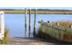 Wooden boat ramp leading to calm water at 818 Club Cottage Court, Edisto Beach, SC 29438