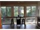 Sunroom with a table and chairs, offering a view of the outdoors at 818 Club Cottage Court, Edisto Beach, SC 29438