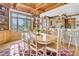 Kitchen dining area with hardwood floors, light wood cabinets, and a view at 1408 Palmetto Blvd, Edisto Island, SC 29438