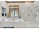 Luxurious bathroom with soaking tub, walk-in shower, and large window at 1408 Palmetto Blvd, Edisto Island, SC 29438