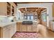 Modern kitchen with stainless steel appliances and light wood cabinets at 1408 Palmetto Blvd, Edisto Island, SC 29438