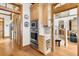 Built-in oven and microwave in a spacious kitchen with wood cabinets at 1408 Palmetto Blvd, Edisto Island, SC 29438