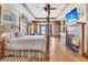 Main bedroom with ocean views, fireplace and built-in shelving at 1408 Palmetto Blvd, Edisto Island, SC 29438