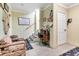 Finished basement with staircase, seating area, and nautical decor at 1408 Palmetto Blvd, Edisto Island, SC 29438