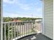 Private balcony overlooking the neighborhood at 1408 Palmetto Blvd, Edisto Island, SC 29438