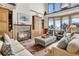 Living area with fireplace, built-in shelving, and a view at 1408 Palmetto Blvd, Edisto Island, SC 29438