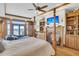 Main bedroom with ocean views, fireplace and large TV at 1408 Palmetto Blvd, Edisto Island, SC 29438