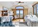 Ocean view bedroom with a sitting area and twin bed at 1408 Palmetto Blvd, Edisto Island, SC 29438