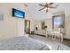 Bright bedroom with a dresser, desk, and TV at 1408 Palmetto Blvd, Edisto Island, SC 29438