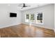 Spacious bedroom with hardwood floors and access to a balcony at 3583 Somerset Hills Ct, Mount Pleasant, SC 29466