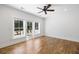 Bright bedroom with hardwood floors and access to a balcony at 3583 Somerset Hills Ct, Mount Pleasant, SC 29466