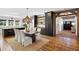 Open concept kitchen with island, dark cabinetry, and hardwood floors at 3583 Somerset Hills Ct, Mount Pleasant, SC 29466