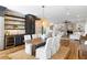 Kitchen dining area with wood table, woven pendant, and view into living room at 3583 Somerset Hills Ct, Mount Pleasant, SC 29466