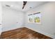 Simple bedroom with hardwood floors and ceiling fan at 3583 Somerset Hills Ct, Mount Pleasant, SC 29466
