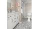 Updated bathroom features a white vanity, hexagon tile floors, and a walk-in shower at 1712 Live Oak Park, Seabrook Island, SC 29455