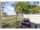 Deck overlooking marsh views with seating and a bird feeder at 1712 Live Oak Park, Seabrook Island, SC 29455