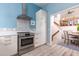 Modern kitchen with stainless steel appliances and white shaker cabinets at 1712 Live Oak Park, Seabrook Island, SC 29455
