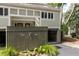 Exterior view of the property, showing two attached garages and a shared fence at 1712 Live Oak Park, Seabrook Island, SC 29455