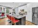Modern kitchen with stainless steel appliances, granite countertops, and a large island at 1000 Rivershore Rd, Charleston, SC 29492
