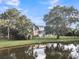 House with screened porch and pond view at 1000 Rivershore Rd, Charleston, SC 29492