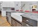 Kitchen island with farmhouse sink and granite countertop at 1000 Rivershore Rd, Charleston, SC 29492