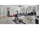 Home gym and office space with various workout equipment at 1000 Rivershore Rd, Charleston, SC 29492