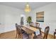 Formal dining room with hardwood floors, chandelier and wainscoting at 1000 Rivershore Rd, Charleston, SC 29492