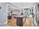 Open concept kitchen with island, stainless steel appliances, and living room view at 1000 Rivershore Rd, Charleston, SC 29492