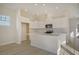 Modern kitchen with white cabinets and an island at 307 Trailmore Ln, Summerville, SC 29486