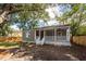 Charming bungalow with a front porch and landscaped yard at 2679 Oregon Ave, North Charleston, SC 29405