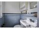 Small bathroom with blue tile and updated vanity at 121 Matheny Dr, Goose Creek, SC 29445