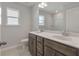 Bathroom with double vanity, wood cabinets, and a shower at 2802 Lacy St, North Charleston, SC 29406