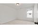 Bright bedroom with neutral walls and carpet, featuring a window with a view at 2802 Lacy St, North Charleston, SC 29406