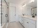 Bathroom with double vanity, large mirror, and glass shower at 2802 Lacy St, North Charleston, SC 29406