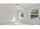 Bright bedroom with neutral carpeting and large windows at 2802 Lacy St, North Charleston, SC 29406