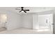 Bright bedroom with ceiling fan and access to bathroom at 2802 Lacy St, North Charleston, SC 29406