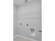 Laundry room with tile flooring, shelving, and hookups at 2802 Lacy St, North Charleston, SC 29406