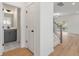 Small powder room with gray vanity and patterned floor at 2802 Lacy St, North Charleston, SC 29406